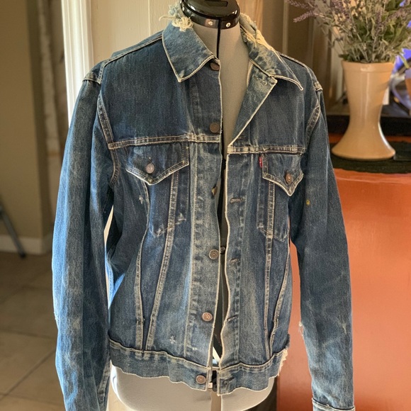 tattered denim jacket